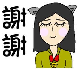 Wen hangs a small bell sticker #8538523