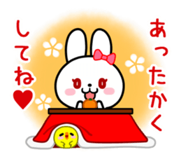 The white rabbit with ribbon in winter sticker #14326239