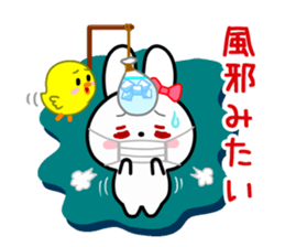 The white rabbit with ribbon in winter sticker #14326246